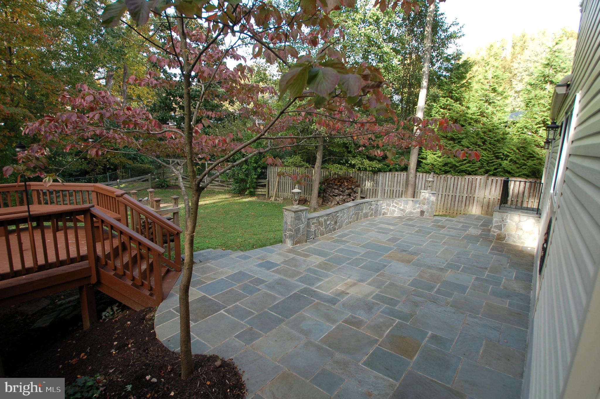 6012 Commack Court Springfield, VA 22152 - Photo 45 of 56 Deck flows to patio for perfect entertaining space