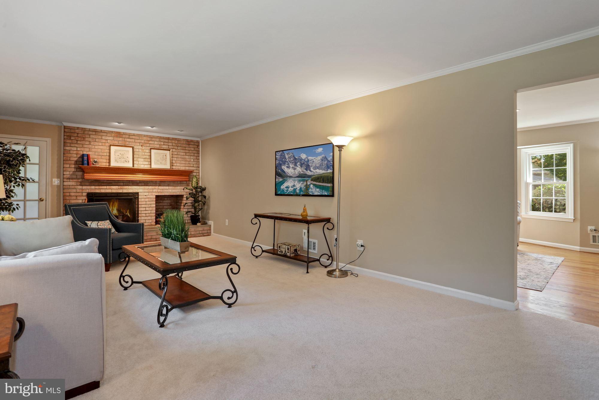 6012 Commack Court Springfield, VA 22152 - Photo 9 of 56 Family Room with brick wood-burning fireplace
