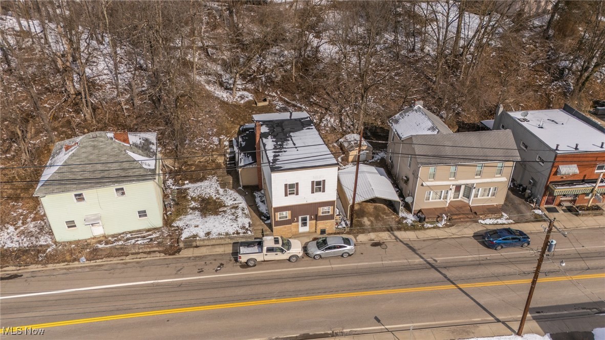 54899 National Road Bridgeport, OH 43912 - Photo 9 of 22 Snowy aerial view featuring a residential view