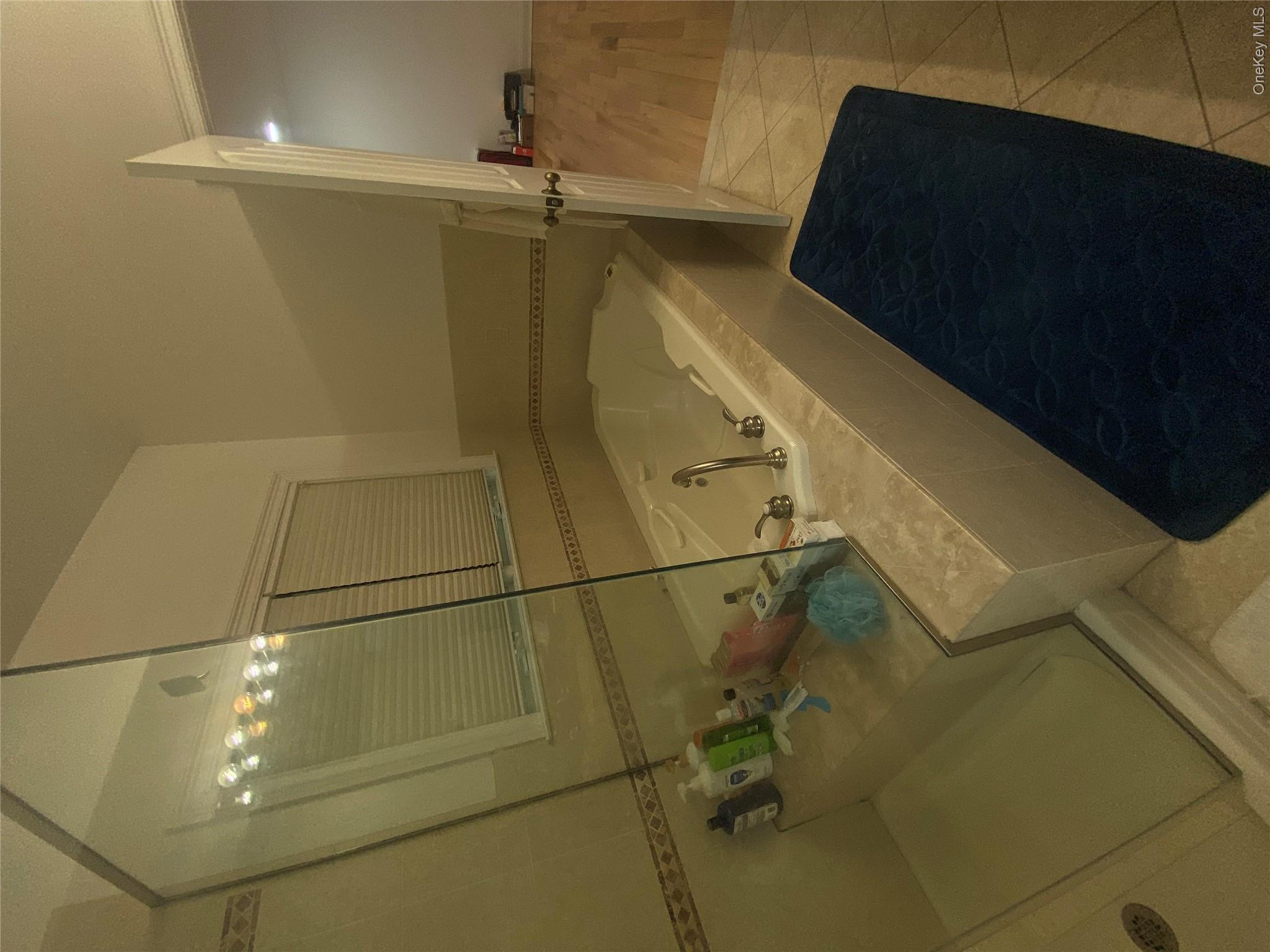 18 Crosshill Road Eastchester, NY 10709 - Photo 6 of 10 a bathroom with a sink and a tub