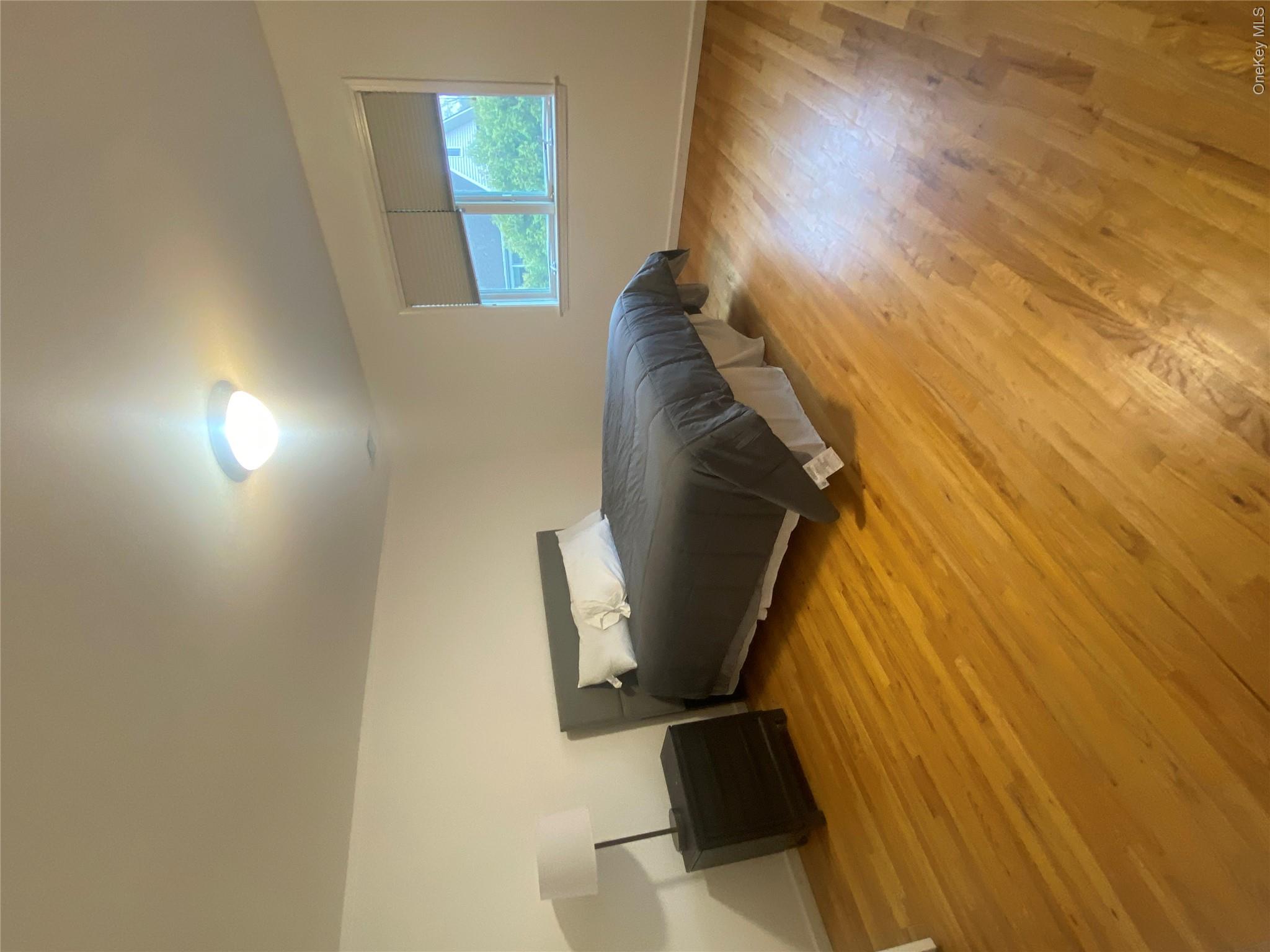 18 Crosshill Road Eastchester, NY 10709 - Photo 8 of 10 a room with a bed