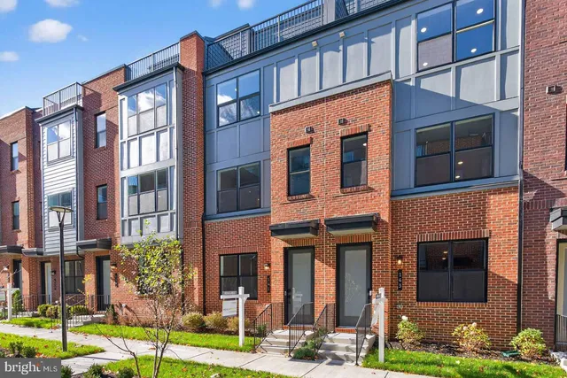a front view of a multi story residential apartment building
