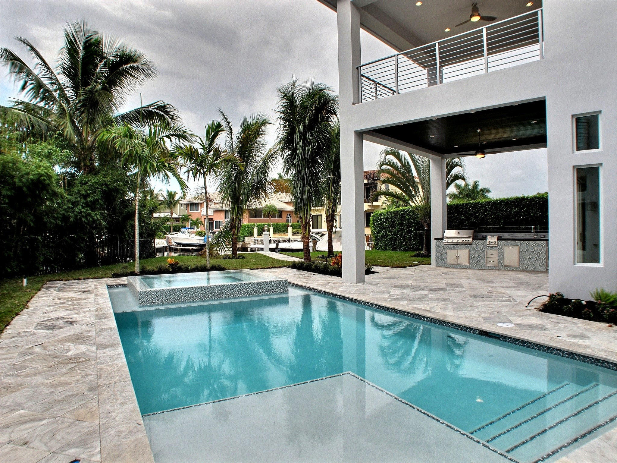 720 Northeast 34th Street Boca Raton, FL 33431 - Photo 4 of 37 exterior rear pool & summer kitchen