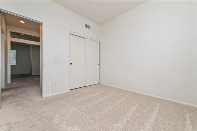 an empty room with closet