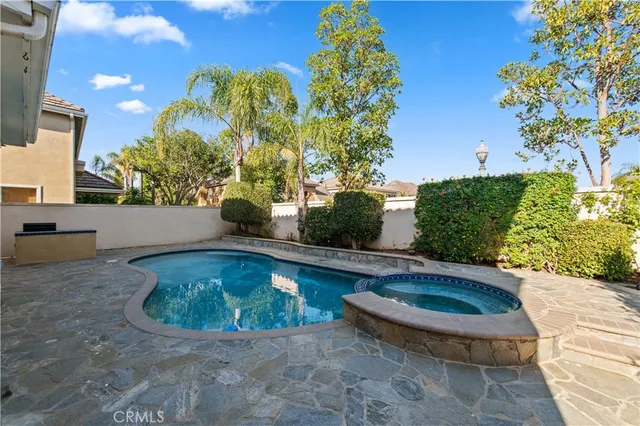 a view of swimming pool from a balcony