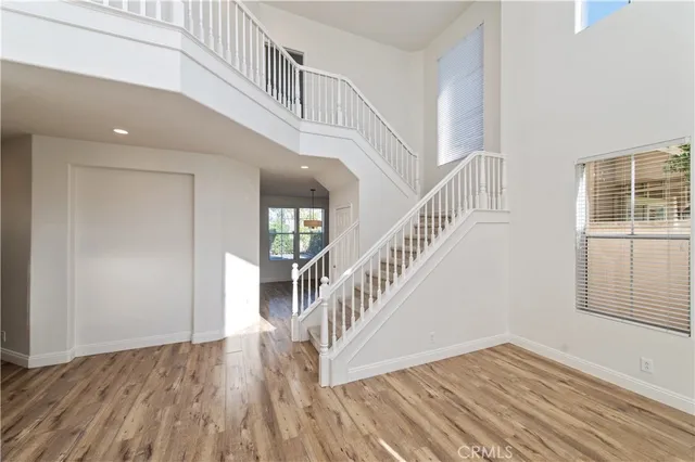 a view of entryway with wooden floor