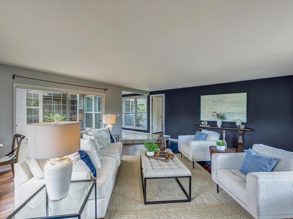 970 Quail Knoll Road Fallbrook, CA 92028 - Photo 16 of 45 a living room with furniture and a large window