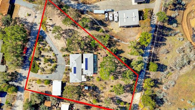 an aerial view of beach and residential buildings