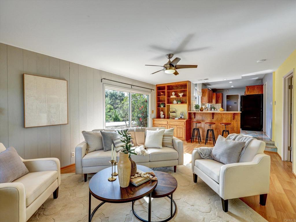 970 Quail Knoll Road Fallbrook, CA 92028 - Photo 7 of 45 a living room with furniture and a large window