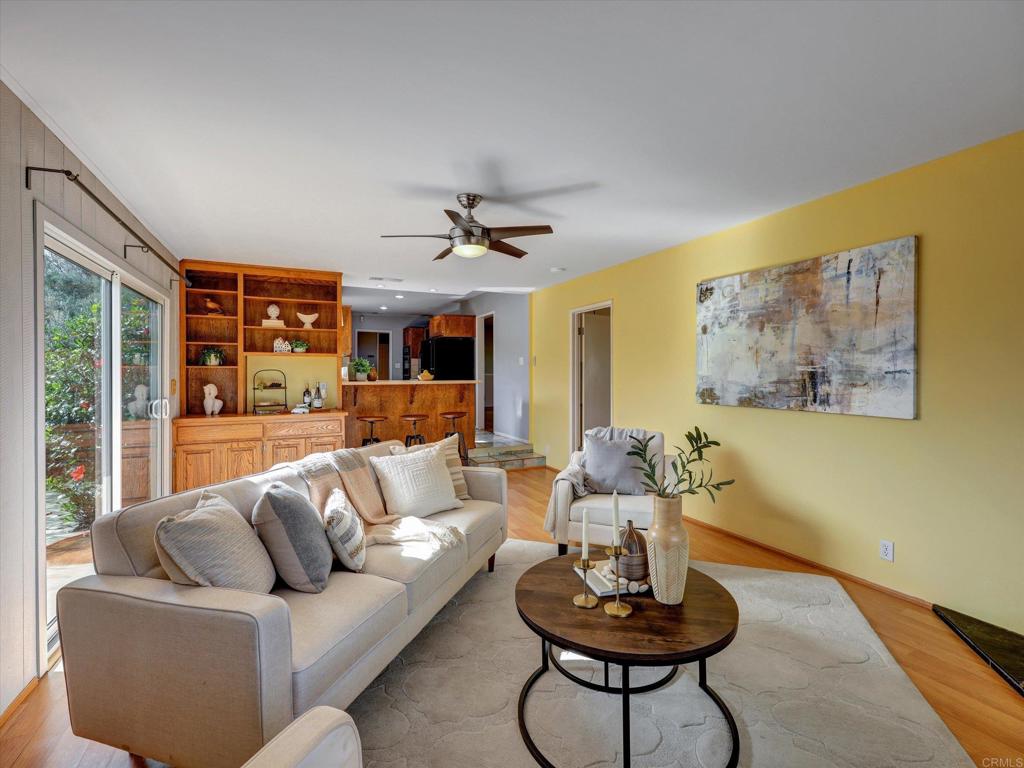 970 Quail Knoll Road Fallbrook, CA 92028 - Photo 9 of 45 a living room with furniture and a large window