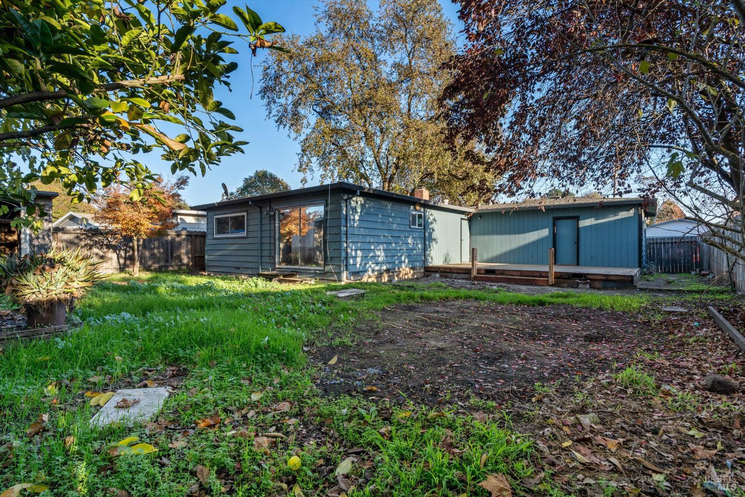 621 Sunny Manor Way Santa Rosa, CA 95401 - Photo 19 of 24 a view of a house with yard and tree s