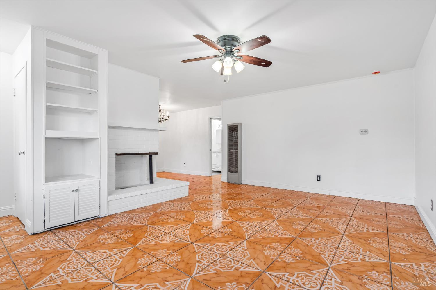 621 Sunny Manor Way Santa Rosa, CA 95401 - Photo 4 of 24 a view of an empty room with a window