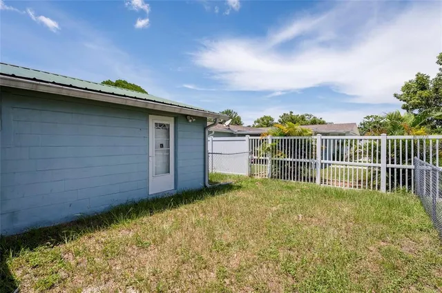 a view of a backyard with a garden