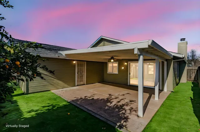 a backyard of a house with garden