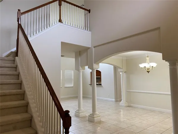 a view of entryway with a front door