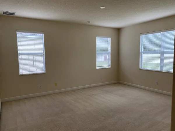 an empty room with an entryway