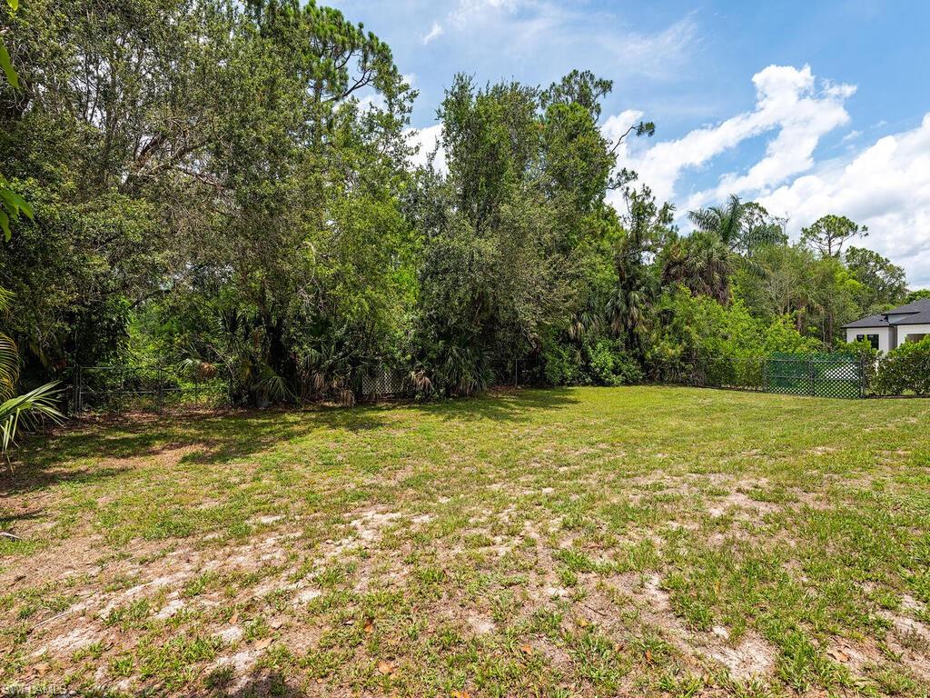 177 6th Street Naples, FL 34113 - Photo 13 of 16 a view of a yard