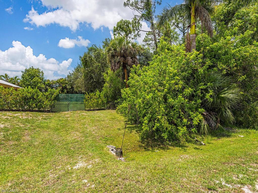 177 6th Street Naples, FL 34113 - Photo 16 of 16 a view of a yard with an outdoor space