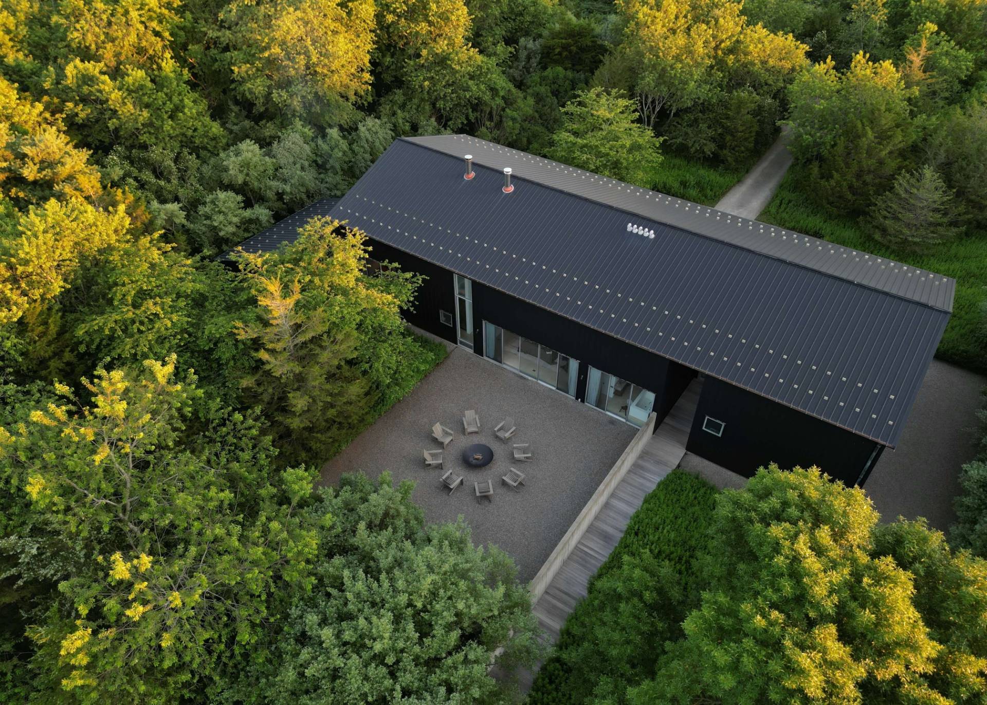78 Windmill Lane Bridgehampton, NY 11932 - Photo 5 of 32 an aerial view of a house with a yard