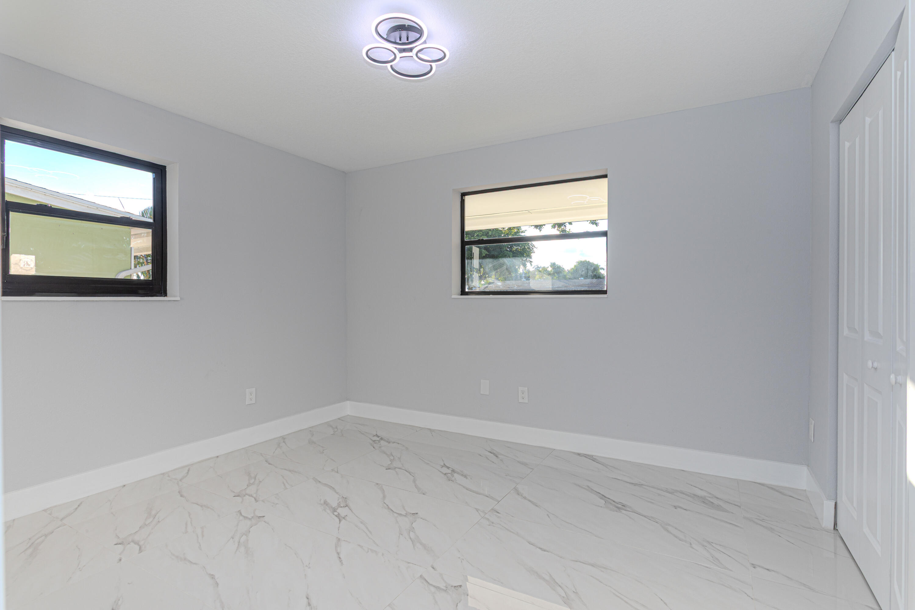 62 Andros Road Palm Springs, FL 33461 - Photo 20 of 41 an empty room with a window