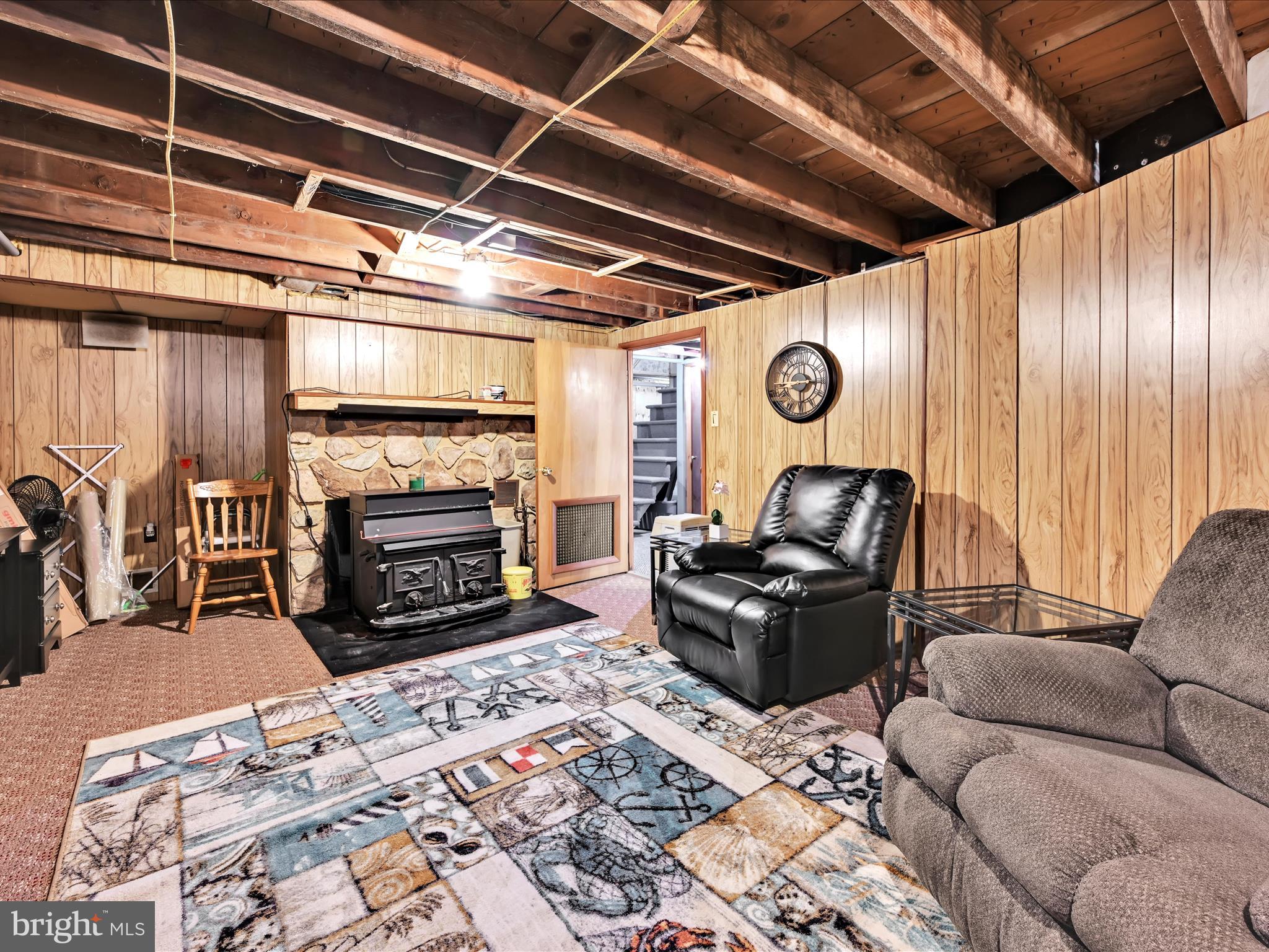7932 Jonestown Road Harrisburg, PA 17112 - Photo 22 of 79 a living room with furniture and a fireplace