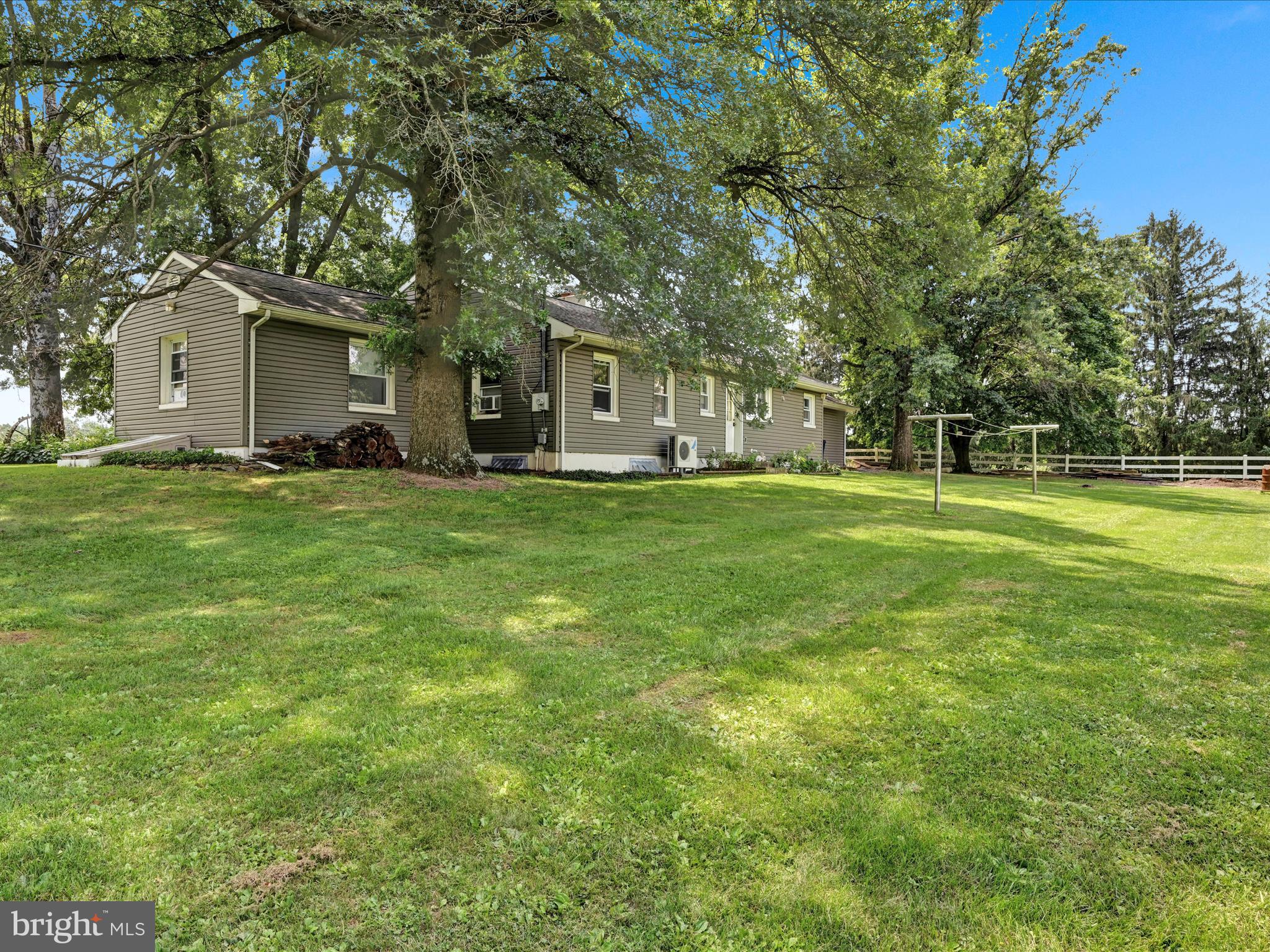 7932 Jonestown Road Harrisburg, PA 17112 - Photo 32 of 79 a view of a house with a big yard and large trees