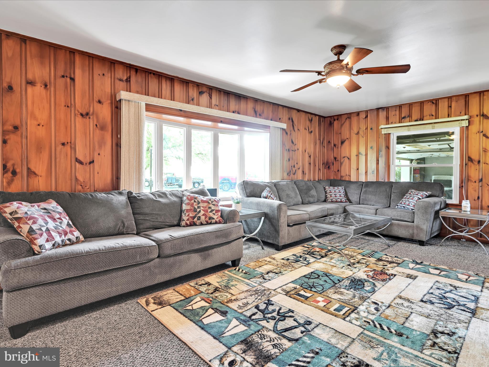 7932 Jonestown Road Harrisburg, PA 17112 - Photo 4 of 79 a living room with furniture and a large window