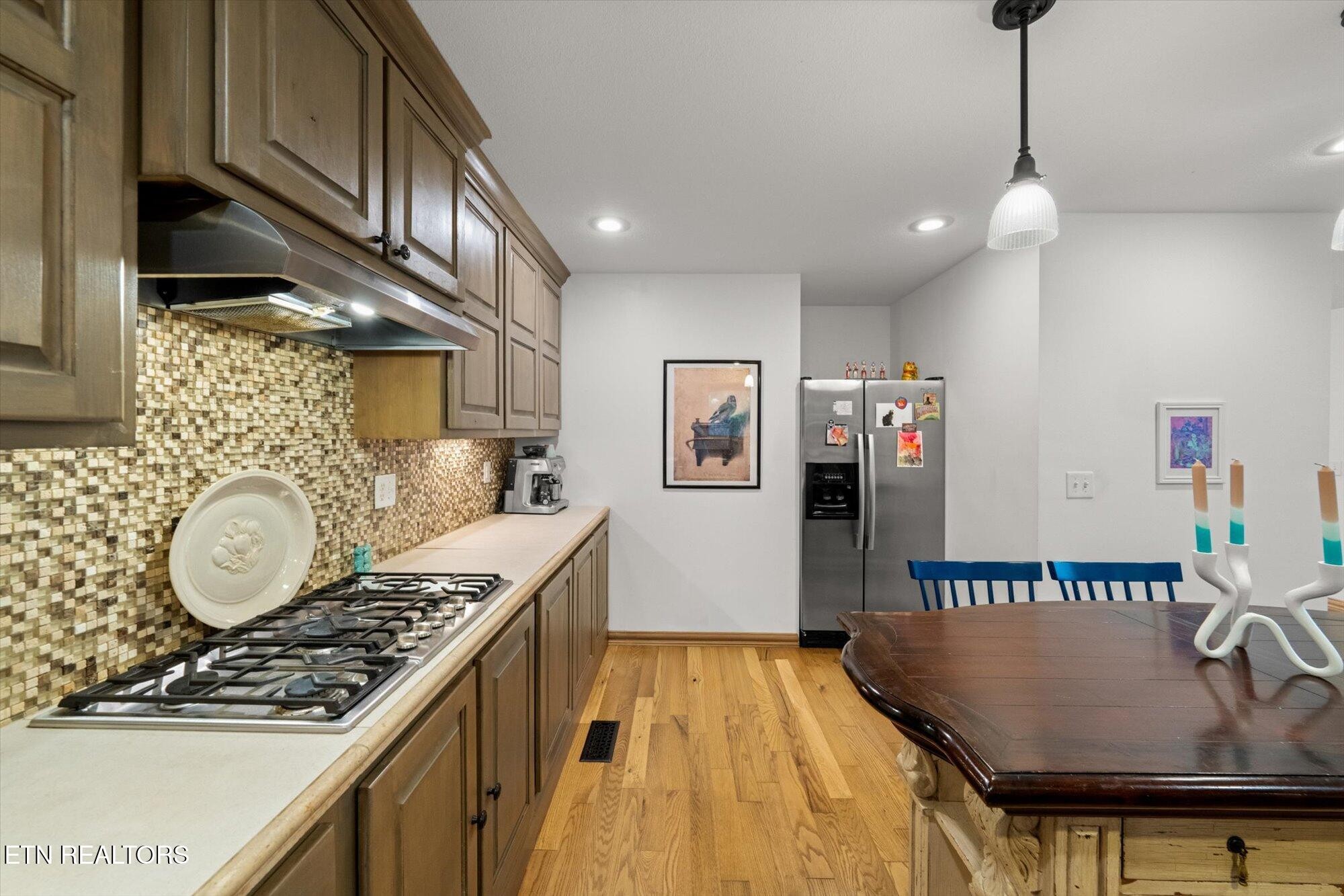 720 East Roddy Road Spring City, TN 37381 - Photo 16 of 58 a kitchen that has a lot of cabinets