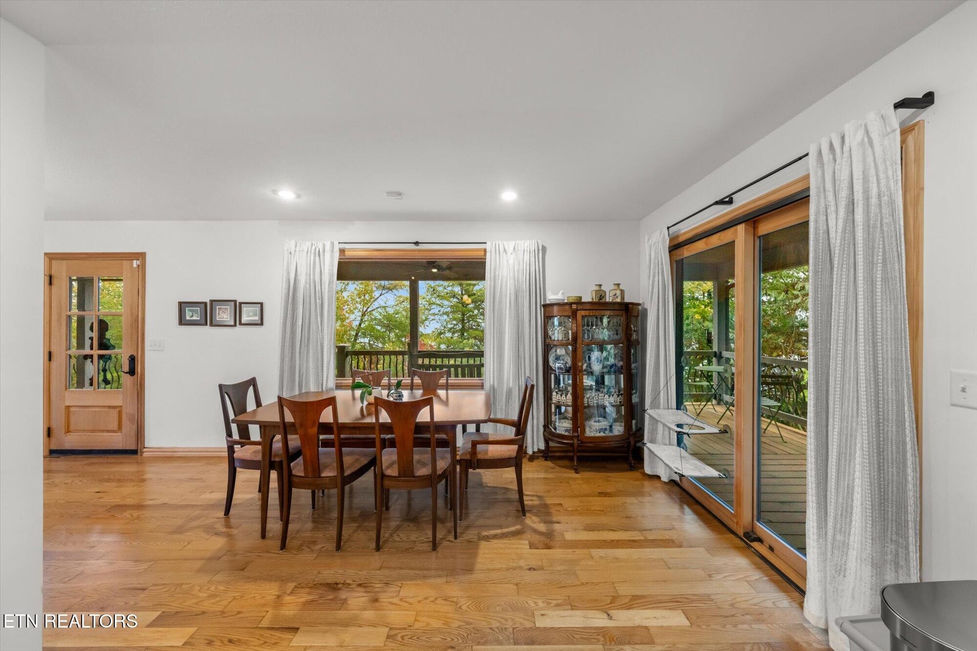 720 East Roddy Road Spring City, TN 37381 - Photo 17 of 58 a view of a dining room with furniture window and outside view