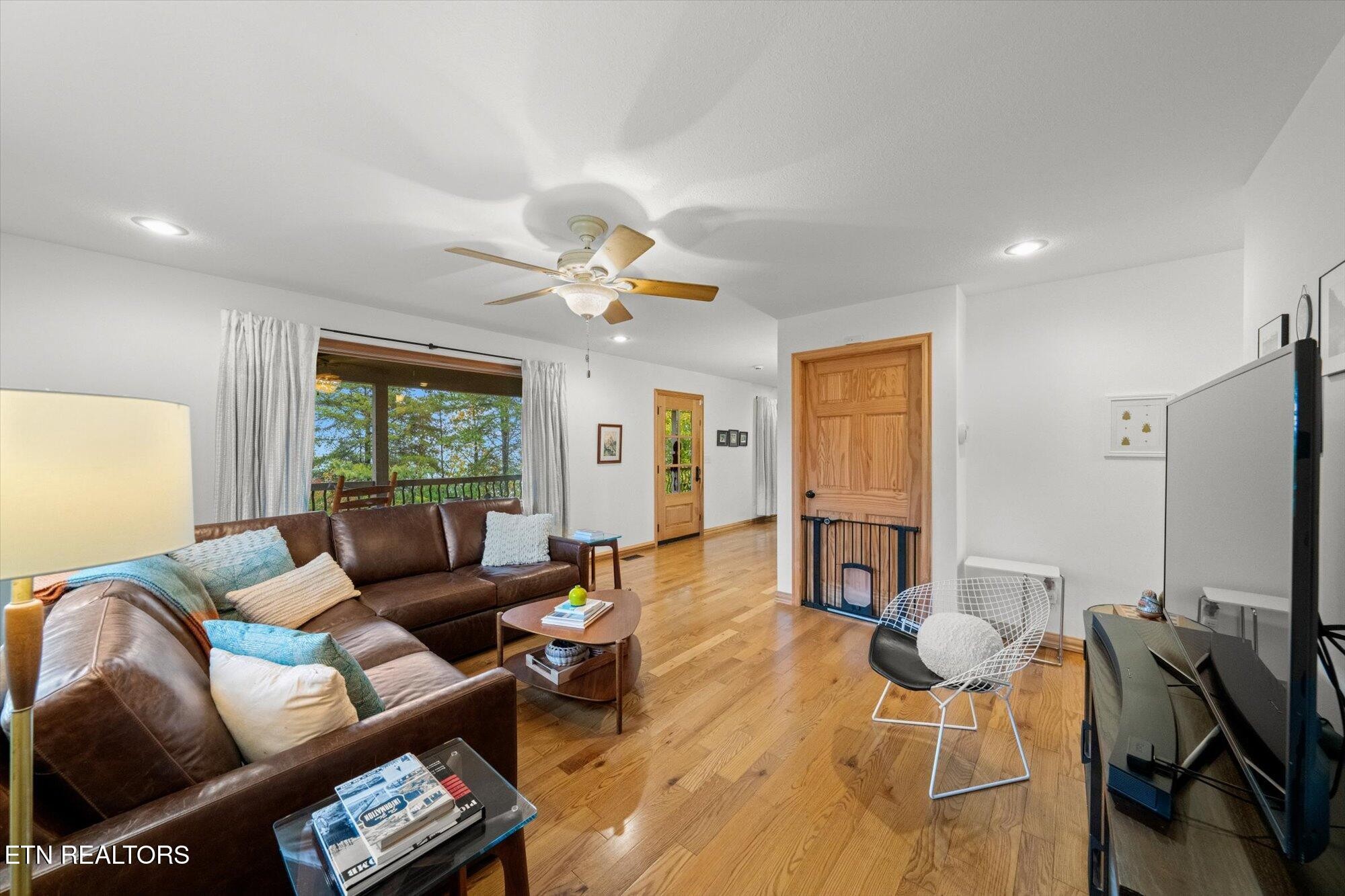 720 East Roddy Road Spring City, TN 37381 - Photo 21 of 58 a living room with furniture and a flat screen tv