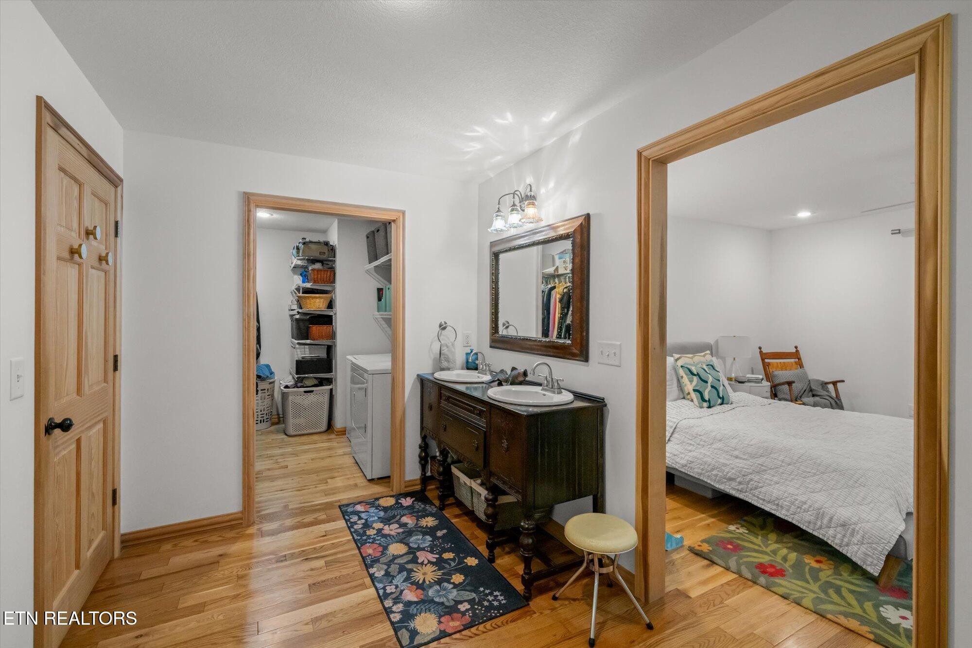 720 East Roddy Road Spring City, TN 37381 - Photo 27 of 58 a bedroom with furniture and a dresser