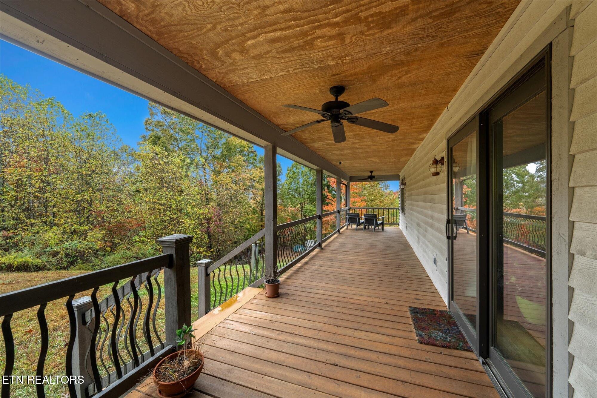 720 East Roddy Road Spring City, TN 37381 - Photo 38 of 58 a view of a balcony with wooden floor