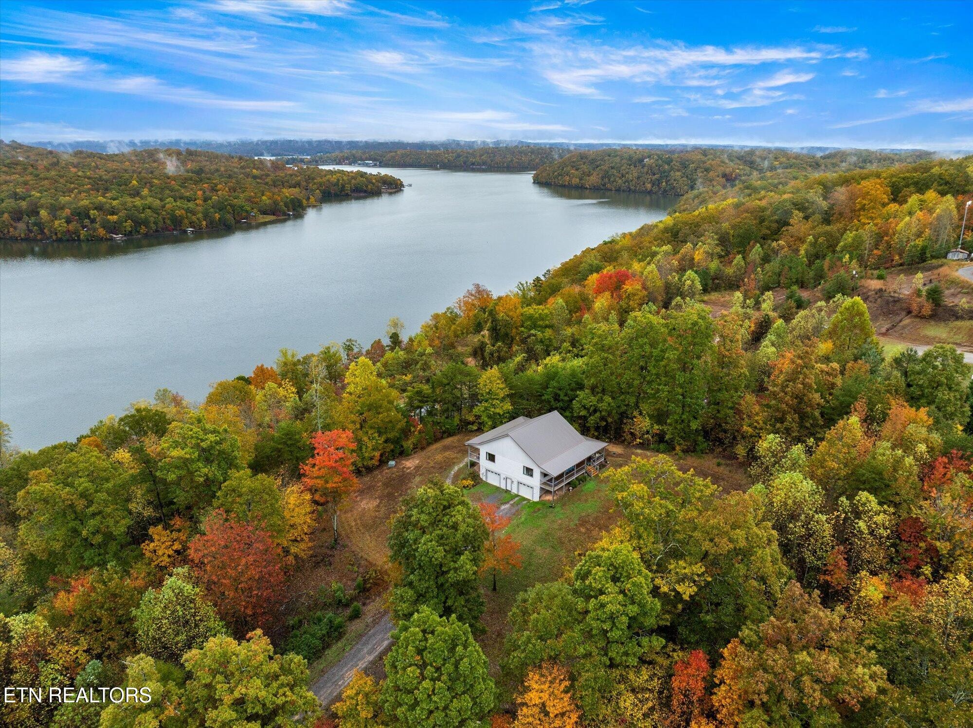 720 East Roddy Road Spring City, TN 37381 - Photo 42 of 58 an aerial view of house with yard and ocean view