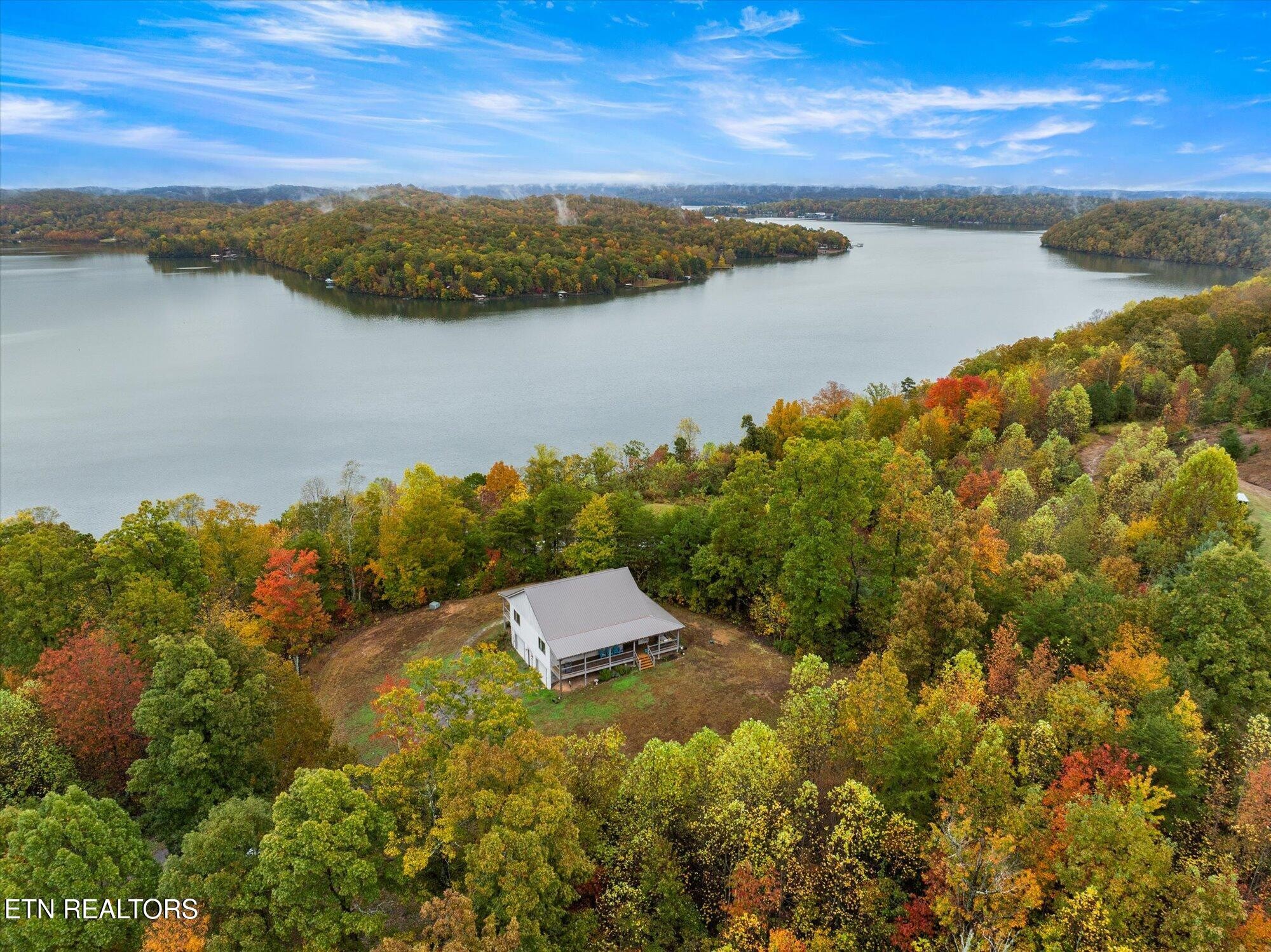 720 East Roddy Road Spring City, TN 37381 - Photo 47 of 58 a view of lake with mountain
