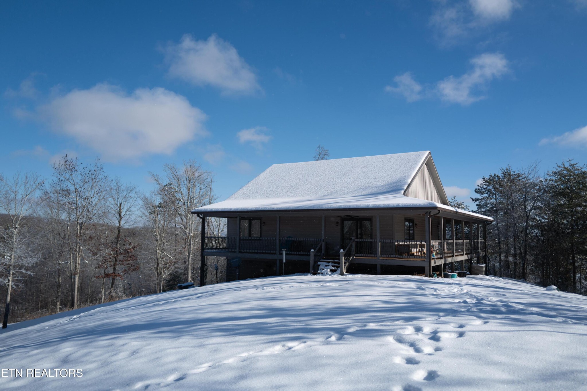 720 East Roddy Road Spring City, TN 37381 - Photo 50 of 58 a front view of a house with a garden