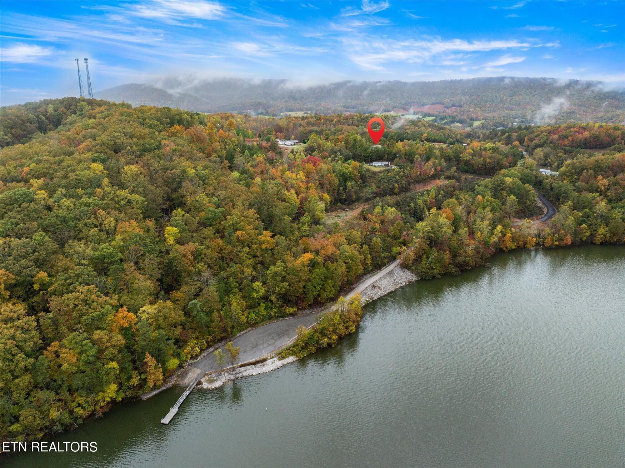 720 East Roddy Road Spring City, TN 37381 - Photo 6 of 58 a view of a city