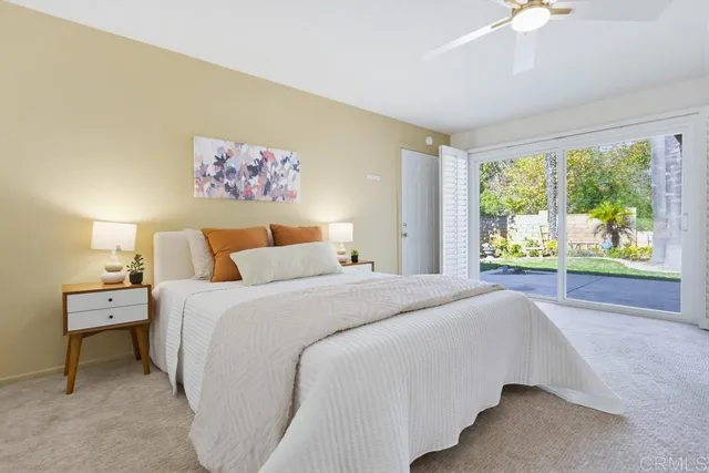 a bathroom with a sink a large mirror and vanity