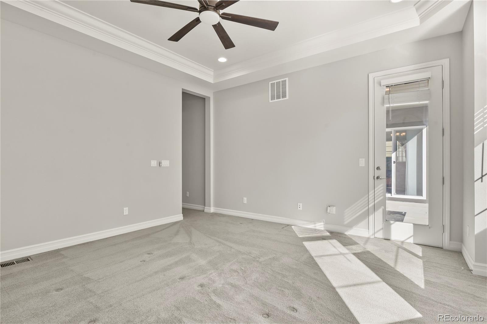 12938 Bridge View Lane Parker, CO 80134 - Photo 22 of 47 a view of an empty room with a window