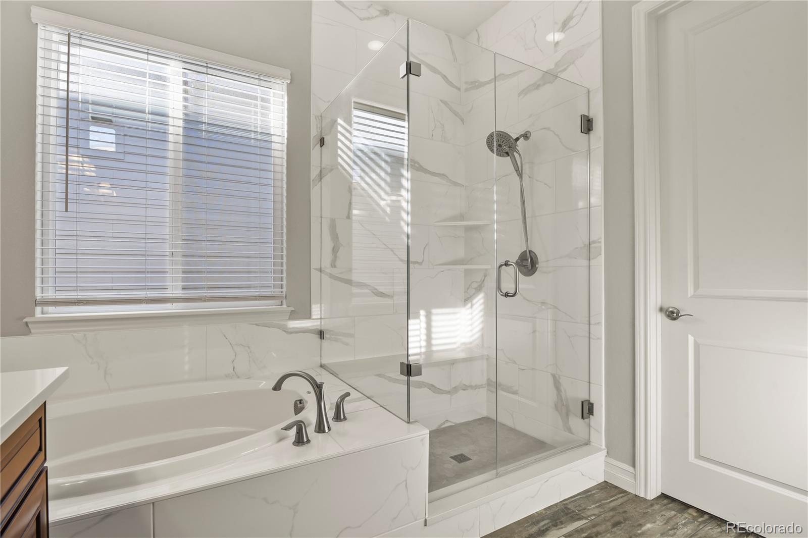 12938 Bridge View Lane Parker, CO 80134 - Photo 24 of 47 a bathroom with a shower and a sink