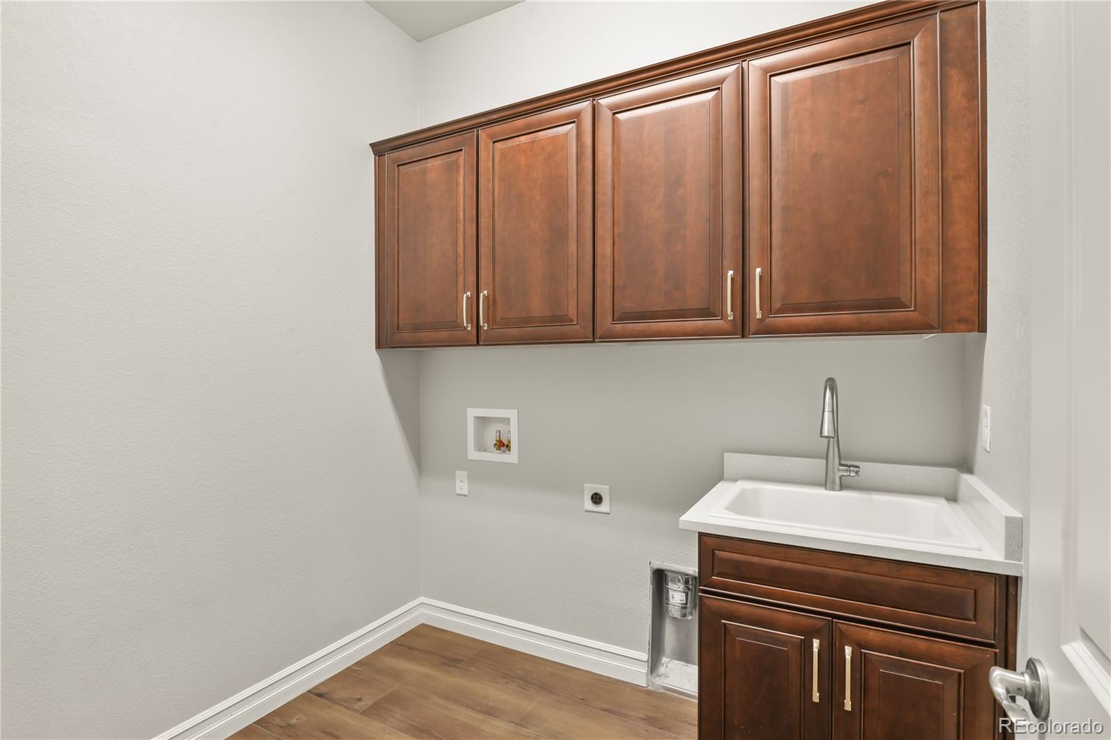 12938 Bridge View Lane Parker, CO 80134 - Photo 31 of 47 a room with storage and utility