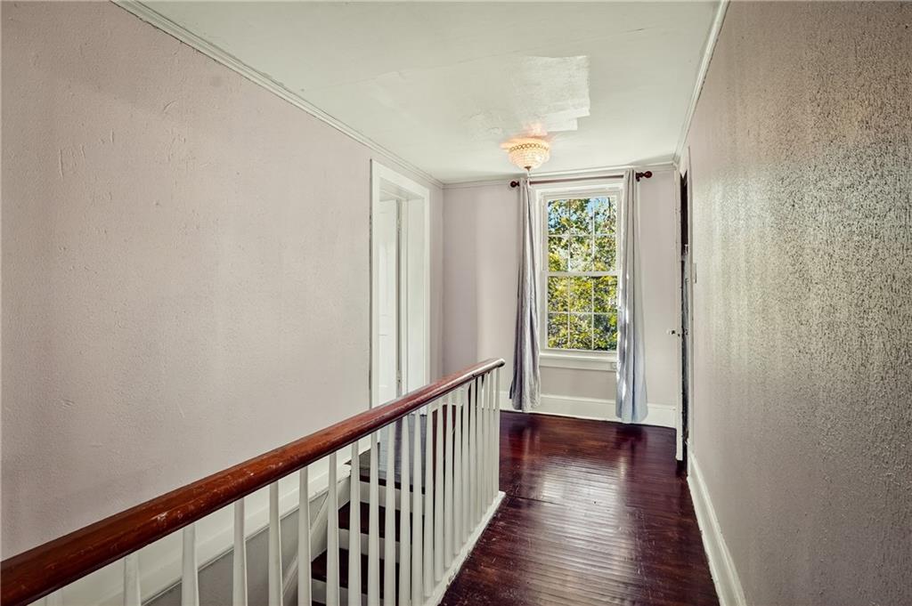 1702 3rd Avenue New Brighton, PA 15066 - Photo 11 of 40 a view of a hallway with wooden floor and entryway