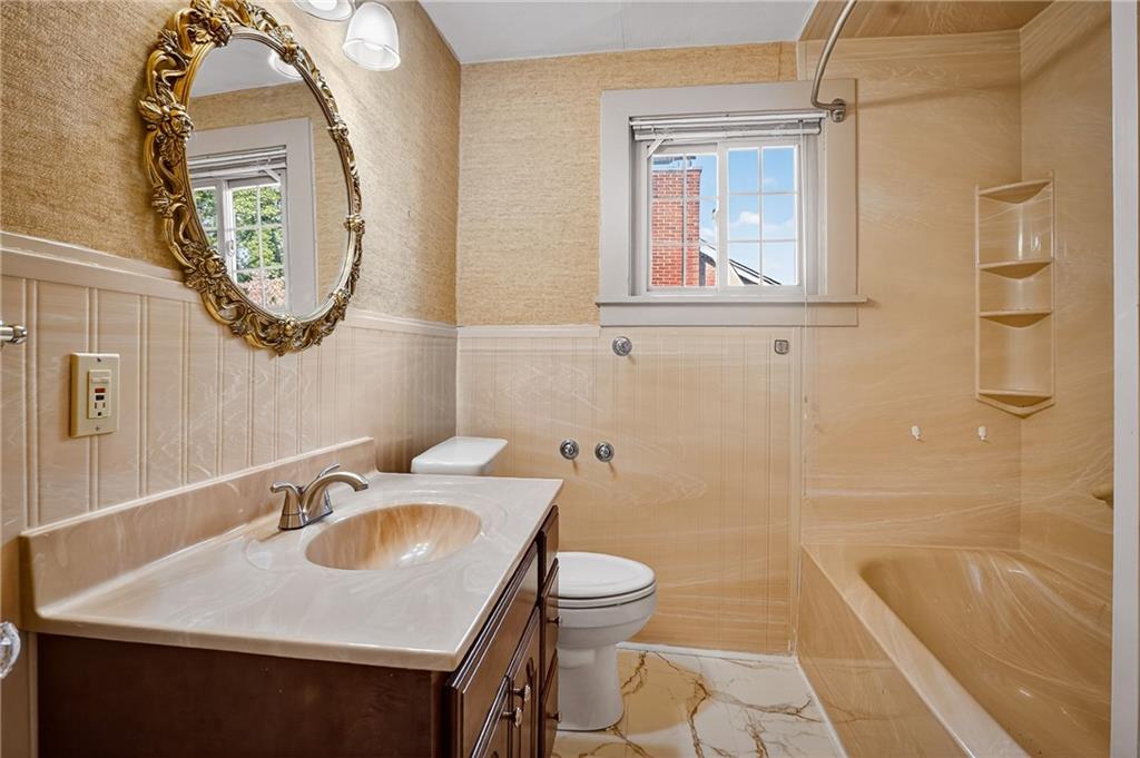 1702 3rd Avenue New Brighton, PA 15066 - Photo 20 of 40 a bathroom with a sink and a mirror