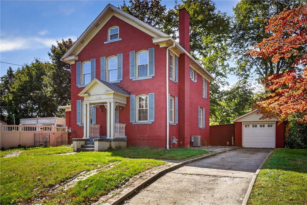 1702 3rd Avenue New Brighton, PA 15066 - Photo 2 of 40 a front view of a house with garden