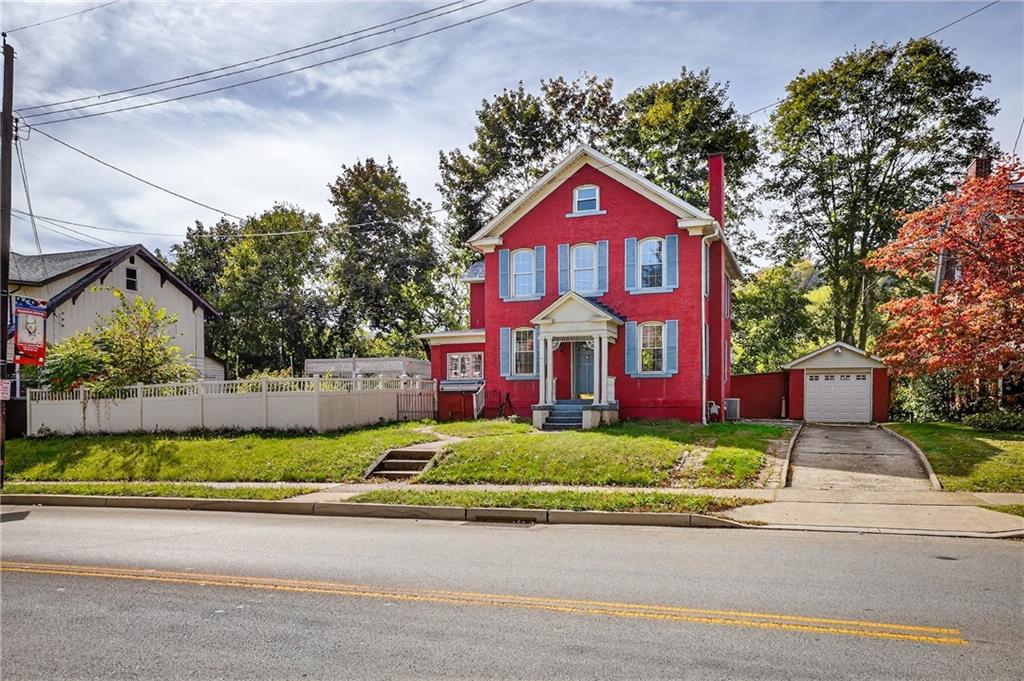 1702 3rd Avenue New Brighton, PA 15066 - Photo 26 of 40 a front view of a house with a yard
