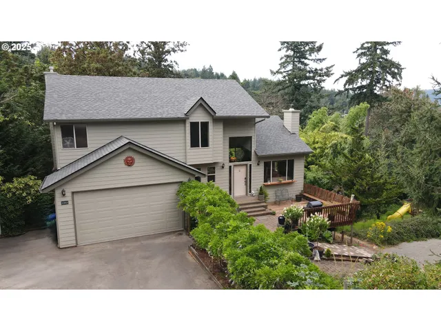 a house view with a garden space