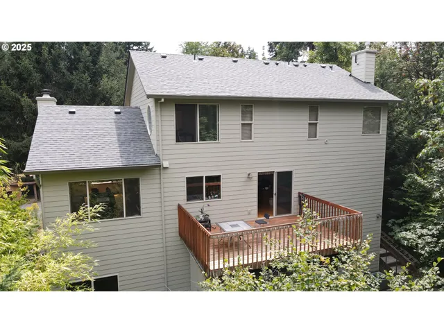 a aerial view of a house with a garden