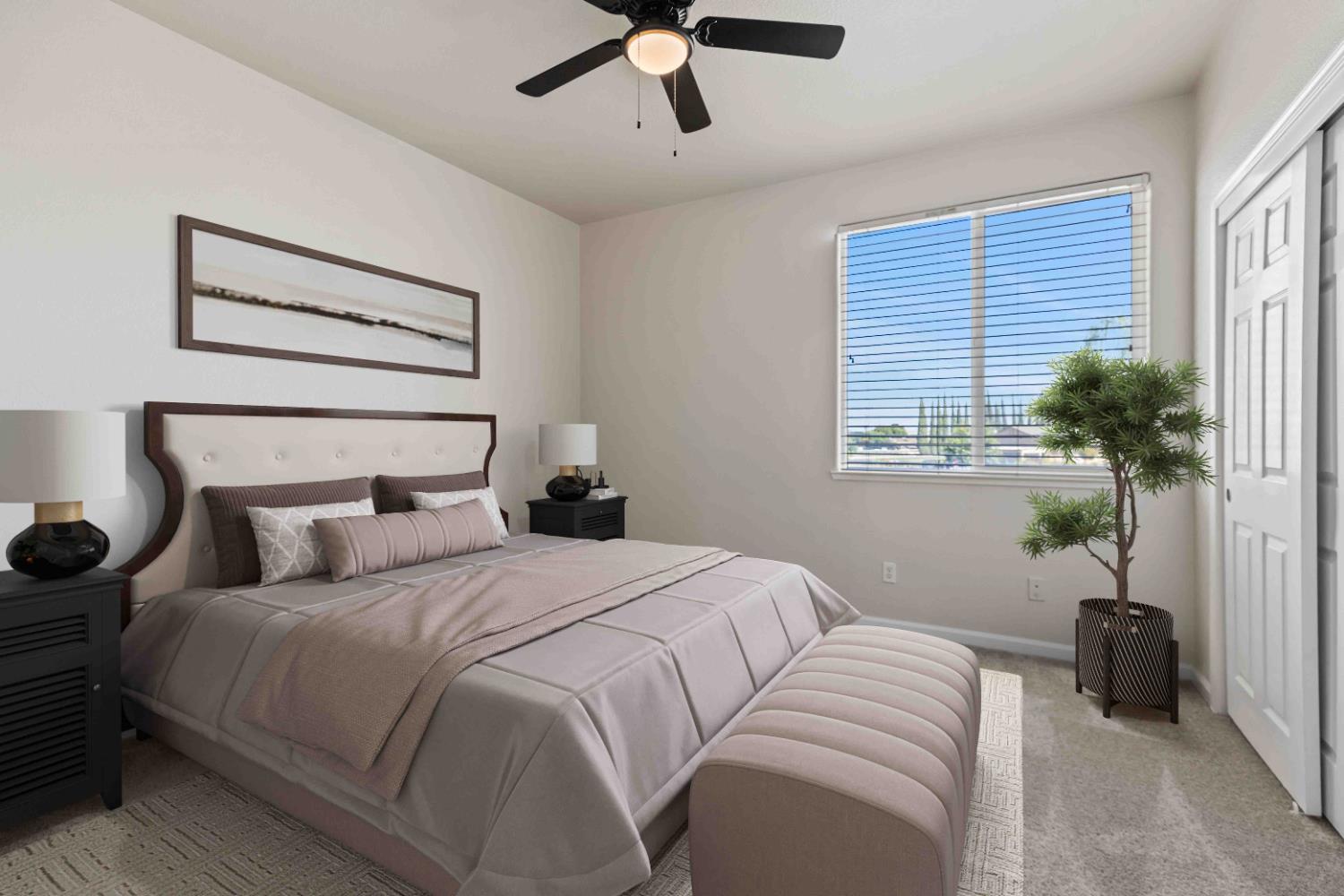 3913 Bayview Drive Modesto, CA 95355 - Photo 23 of 47 a bedroom with a large bed and a window