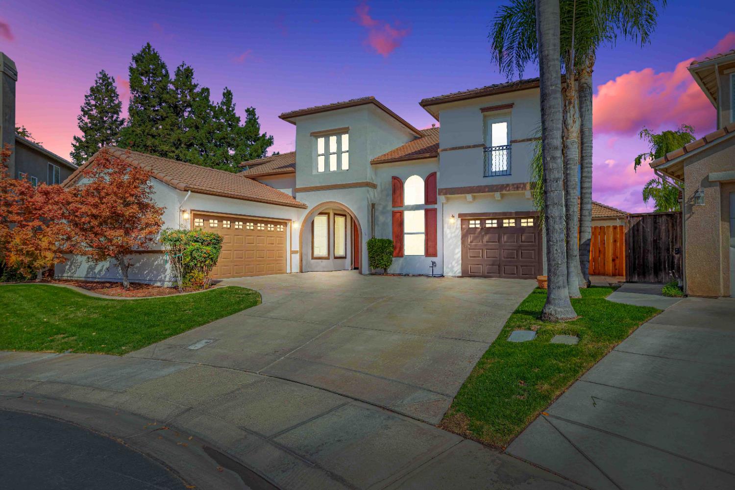 3913 Bayview Drive Modesto, CA 95355 - Photo 3 of 47 a front view of a house with a yard and garage