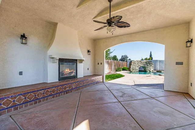 a front view of house with yard and outdoor seating