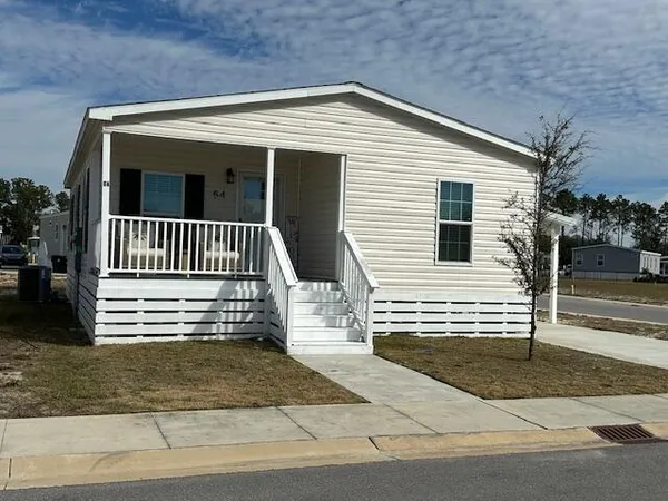 a view of a house with a white door